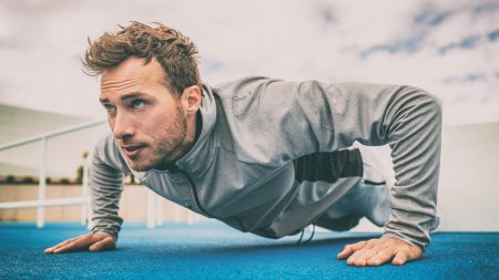 Man doing pushups in the cold weather feature image