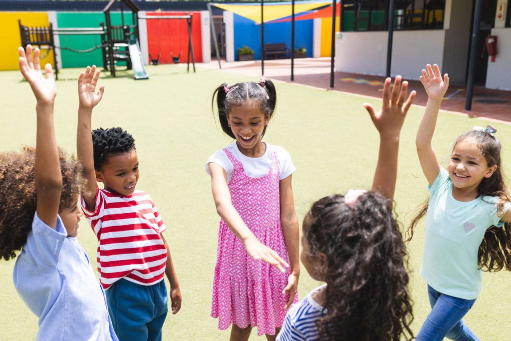 school-playground-is-lively-with-diverse-children school children playing