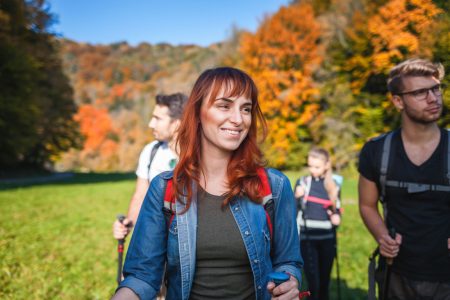 woman hiking with friends