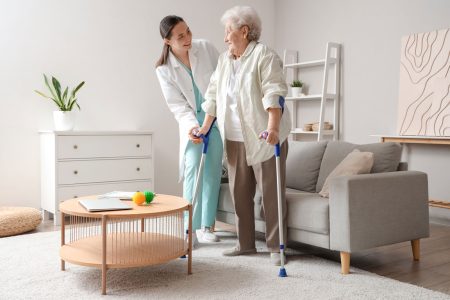 caregiver and senior in home